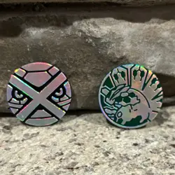 Official POKEMON Zygarde Green AND Metagross Black Flipping Coins / Tokens - Image 1