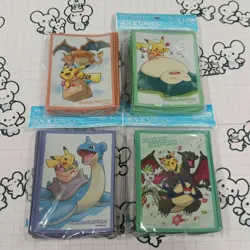 Pokemon Card Sleeves Set 4 Unopened Deck Shields Pikachu Charizard Snorlax - Image 1