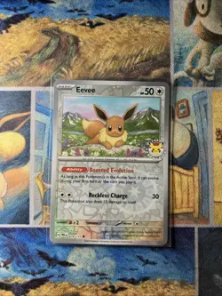 Eevee - (Pokemon Day 2025) (Reverse Cosmos Holo) - Image 1