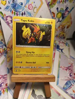 2017 Pokemon TCG Tapu Koko SM30 Black Star Promo Cosmos Holo - Image 1