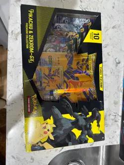 Pokemon TCG Pikachu and Zekrom GX Tag Team Premium Collection GameStop Card 820650809910 - Image 1
