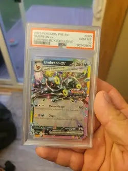PSA 10 UMBREON EX 060 SURPRISE BOX EXCLUSIVE 2025 POKEMON PRISMATIC EVO STAMPED - Image 1