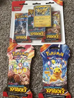 Pokemon Surging Sparks Lot Of Sealed Packs - Image 1