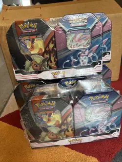 5x Pokemon Trading Card Game: Flareon Syleveon Tin Bundle 820650855641 - Image 1