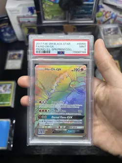2017 Pokemon Ho-Oh GX Rainbow Rare Holo Black Star Promo SM80 PSA 9 Mint Card - Image 1