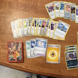 Pokemon Card Lot With Charizard Card Protectors - Image 1