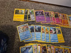 Pokemon TCG Bulk Card Bundle - Approx. 200 Cards + Tin + Sleeves - Image 3