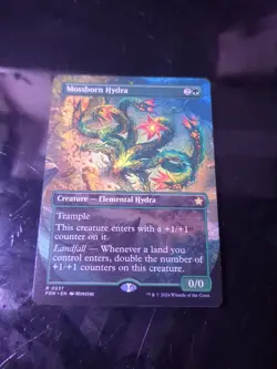 Mossborn Hydra (Borderless) - Near Mint MTG Foundations - Image 1