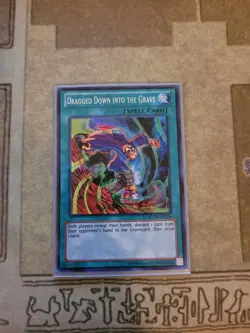 YUGIOH DRAGGED DOWN INTO THE GRAVE LCYW-EN174 SUPER UNLIMITED ED NM - Image 1