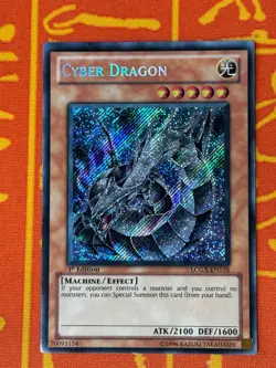 YUGIOH CYBER DRAGON SECRET RARE 1ST EDITION MODERATE PLAY LCGX-EN176 - Image 1