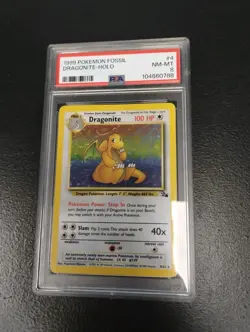 1999 POKEMON FOSSIL #4 DRAGONITE-HOLO PSA 8 - Image 1