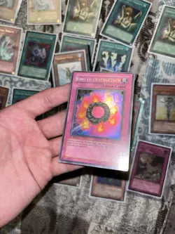 Yugioh Ring of Destruction PGD-000 1st Edition Secret Rare LP Card - Image 1