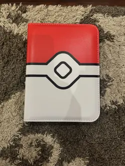 Pokemon Pokeball Binder red and white with card sleeves - Image 1
