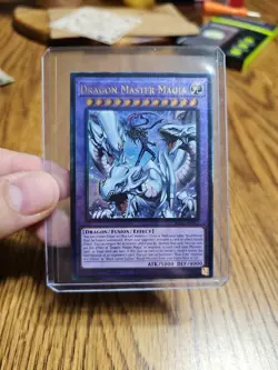 Dragon Master Magia Prismatic Ultimate Rare RA04-EN055 Yugioh Blue-Eyes - Image 1
