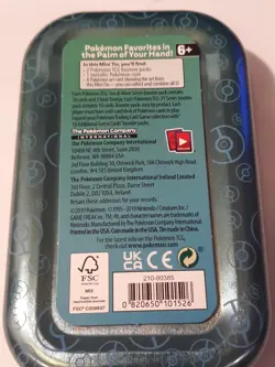 Pokemon cards in a tin. Sealed pack of basic energy cards with a free coin! - Image 2
