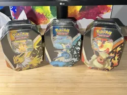 Pokemon TCG: Eevee Evolutions Tin (Set Of 3) Jolteon/Vaporeon/Flareon - Image 1
