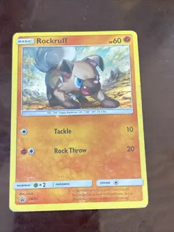 Rockruff SM06 NM Black Star Promo Cosmos Holo Foil Pokemon Card TCG - Image 1