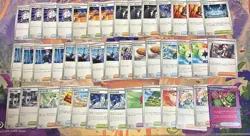 Unused Pokemon Trading Card Collection Including Rare Cards and Characters - Image 1