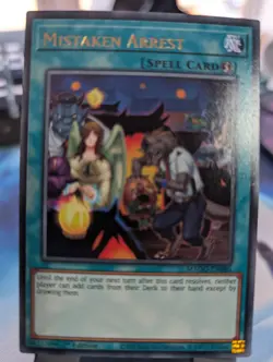 YuGiOh! Mistaken Arrest MAGO-EN080 Gold Rare 1st Ed - Image 1