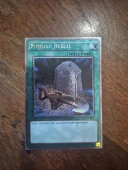 Yugioh Foolish Burial NKRT-EN028 Platinum (NM) - Image 1