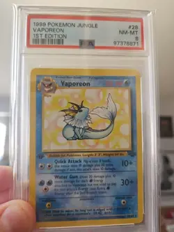 Pokemon TCG Vaporeon Jungle Card 28/64 Regular 1st Edition Rare PSA 8 - Image 1