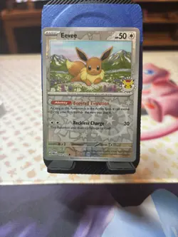 Eevee - (Pokemon Day 2025) (Reverse Cosmos Holo) 074/131 - Image 1