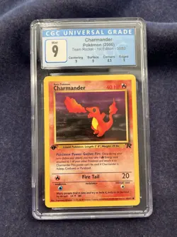 CGC 9 MINT Charmander Team Rocket 1st Edition 2000 Pokemon WOTC 50/82 - Image 1