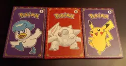 3 Sealed Pokemon Packs from 2023 McDonald's Happy Meal - Image 1