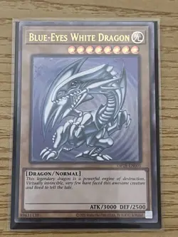 Yugioh TCG Blue Eyes White Dragon Ultimate Rare OP28 Near Mint - Image 1