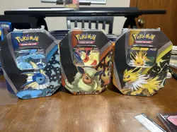 Pokemon TCG Sealed Eeveelutions Tin (Set Of 3) Jolteon/Vaporeon/Flareon - Image 1