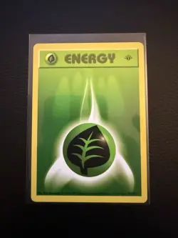 1999 Pokemon Base Set 1st Edition Grass Energy 99/102 Near Mint - Image 1