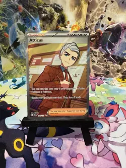Atticus 134/131 Prismatic Evolutions Full Art Trainer Holo Pokemon TCG Card NM - Image 1