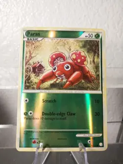 Pokemon - HGSS Base - Paras 76/123 Reverse Holo LP Card - Image 1