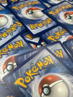 50 Pokemon Card Bulk Lot - 40 Regular/10 Holo - Common/Uncommon/Rare Cards - NM - Image 1