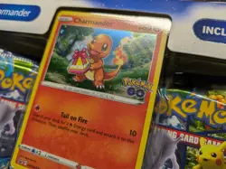 Pokemon Go Sealed Collection - 2x Eevee Boxes, Charmander Pin, Chansey Tin SWIRL - Image 4