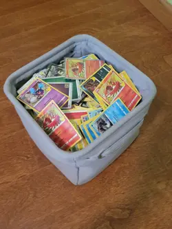 Pokemon TCG Random Bulk + Unused Code Card Lot (Comes in Tins!) - Image 1