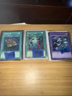 3 Packs Of Yu-Gi-Oh Card Each Have 3 Cards All At Different price Total Of 250$ - Image 1