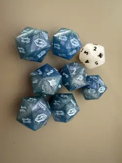 MTG Final Fantasy: Gift Bundle Crystal Blue D20 Die (7 Blue + 1 Regular White) - Image 1