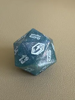 MTG Final Fantasy: Gift Bundle Crystal Blue D20 Die (7 Blue + 1 Regular White) - Image 3