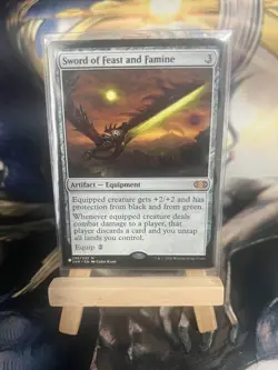 MtG - Sword of Feast and Famine - The List - 296/332 - Artifact - Mythic - Image 1