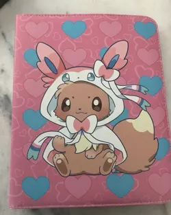 New Pokemon Card Binder Eevee Sylveon Costume Pink Hearts 9-Pocket Zip Album - Image 1