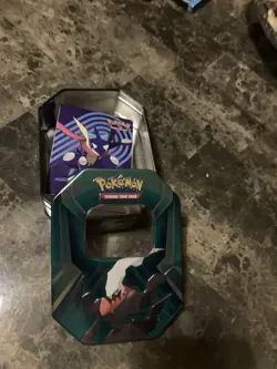 Pokemon TCG Collectible Tins containing card book to Organize Your Cards - Image 1