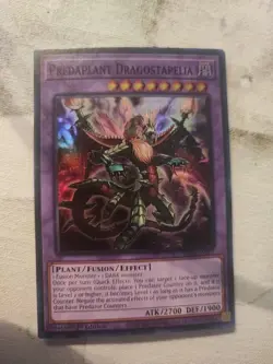 YuGiOh! - Predaplant Dragostapelia - 1st Edition Super Rare RA01-EN027 LP - Image 1