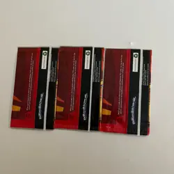2025 McDonalds Pokemon Trading Card Game Sealed Unopened 3 Packs Charizard - Image 2