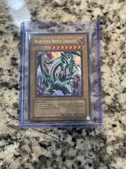 YuGiOh BLUE-EYES WHITE DRAGON LOB-001 Unlimited - Light Play/Near Mint - Image 1