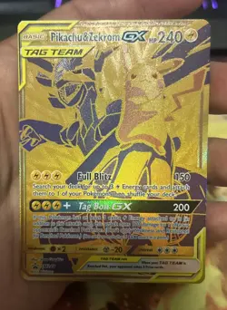 Pokemon Pikachu & Zekrom GX Tag Team Black Star Promo SM248 NM Holo Gold - Image 1