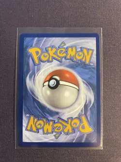 Team Rocket's Tyranitar (Pokemon Center Exclusive) 096/182 Miscellaneous Cards & - Image 2