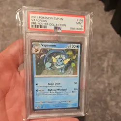 2025 Pokemon SVP Vaporeon 168 Black Star Promo Pre Poster Collection PSA 9 - Image 1
