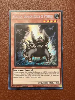 Yugioh Reactan, Dragon Ruler of Pebbles BLMM-EN121 Secret Rare 1st Ed Near Mint - Image 1