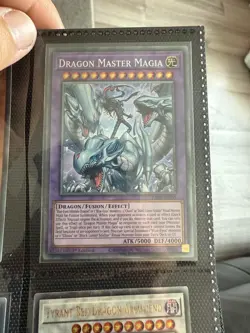 Yugioh RA04-EN055 - Dragon Master Magia - Collectors Rare - Image 1
